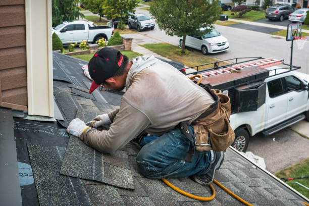 Professional Roofing technician working in Pelham, NY